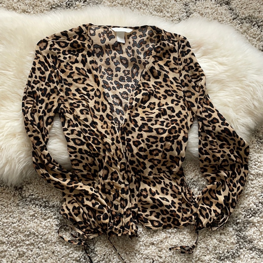 Cheetah print wrap peplum blouse